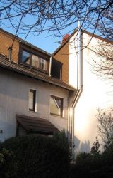 Edelstahlschornstein auf Giebelwand